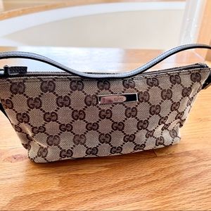 Authentic Gucci monogram boat pochette